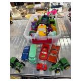 Toy Cars, Tractors, and Figures in Plastic Bin