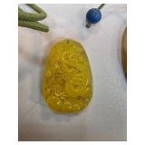 Yellow Jade Pendant with Carved Dragon Motif