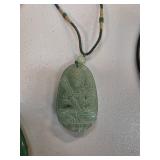 Jade Pendant Necklace Featuring Seated Figure Desi