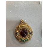 Gold Pendant with Jade and Enamel Details