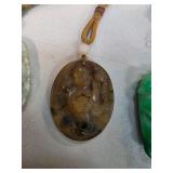 Carved Jade Pendant Featuring Figure Motif