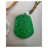 Carved Green Jade Pendant with Cord