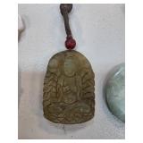 Carved Jade Pendant with Buddha Motif on Cord