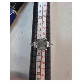 Sterling Silver Ring with Green Gemstone and Clear