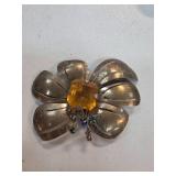 Silver-Toned Floral Brooch with Amber-Colored Cent