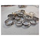 Stainless Steel and Gold-Toned Rings with Detailin