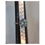 Solitaire-Style Ring with Clear Stone and Paved Ba