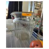 Clear Glass Pitcher with Floral Engraving and Meta