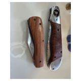Two Folding Pocket Knives With Wooden Handles and
