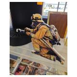 Firefighter-Themed Metal Garden Stake With Hose an