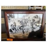 Framed Black-and-White Photo of Group Dining Outdo