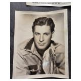 Black-and-White Portrait of a Man in Western Attir