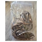 Wristwatches with Metal Bands in a Bag