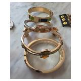 Gold-Tone and Enamel Bangles with Gemstone Accents