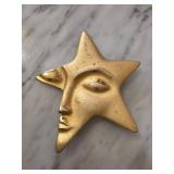 Gold-Toned Star-Shaped Brooch with Face Motif