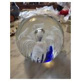 Clear Glass Paperweight With Blue and White Interi