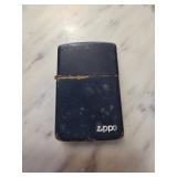 Vintage Zippo Lighter with Blue Finish and Wear