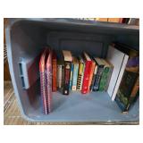 Books and Notebooks in a Plastic Storage Bin