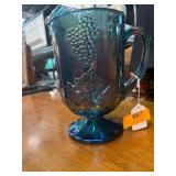 Blue Iridescent Glass Pitcher with Grapevine Motif