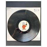 12-Inch Vinyl Record with Cartoon Character on Lab