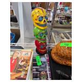 Colorful Stacked Skull Figurine and Skull-Themed I