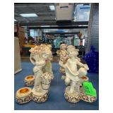 Six Figural Candleholders Featuring Cherub Motif