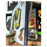 Binder of Collectible Animation-Themed Trading Car