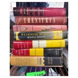 Seven Hardcover Books