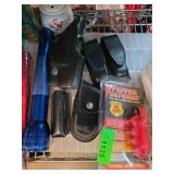Flashlight, Holsters, and Pepper Defense Spray