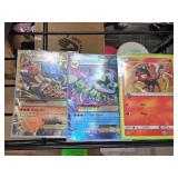 Three Pokemon Trading Cards, Various Types