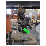 Seated Deity Figurine with Ornamental Design