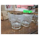 Four Glasses with Gold Accents