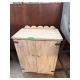 Wooden Cabinet With Scalloped Top Trim