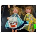 Small Vintage Dolls in Colorful Dresses