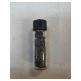 Small Vial Containing Metal Meteorites Fragments