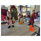 Three Santa Claus Figurines