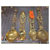 Four Decorative Brass Spoons