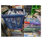 Books in Blue Plastic Basket