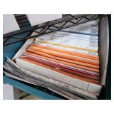 Scrapbook Paper in Plastic Bin