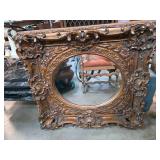 Ornate Oval Framed Wall Mirror