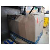 Large Box Containing Clothes