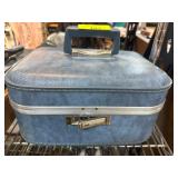Blue Traveling Vanity Case with Quilted Interior