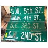 Four Metal Street Signs