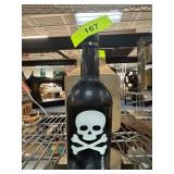 Antique Black Glass Bottle with Skull Design