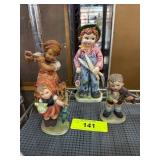 Four Porcelain Figurines with Child Themes