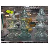 Three Clear Glass Double-Spindle Shapes