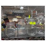 Four Clear Glass Jars with Lids