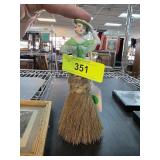 Porcelain Figurine with Brush Skirt