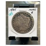 1885 Morgan Silver Dollar in Holder