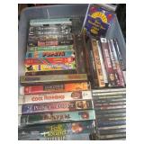 VHS Tapes and CDs Assortment